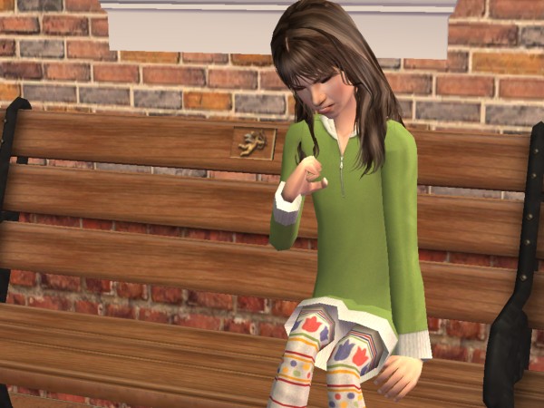 Regan sitting on a bench